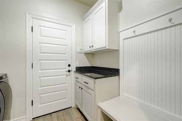 mudroom with light wood-type flooring and washer / clothes dryer