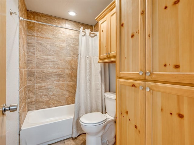 full bath with a closet, tile patterned flooring, shower / bath combination with curtain, and toilet