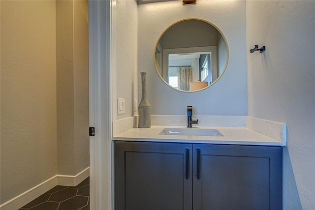 1212 W Wilshire Blvd, Nichols Hills, OK 73116 - bathroom with tile patterned flooring, vanity, and a textured wall