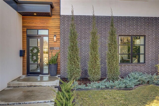 1212 W Wilshire Blvd, Nichols Hills, OK 73116 - view of exterior entry featuring brick siding