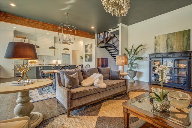1212 W Wilshire Blvd, Nichols Hills, OK 73116 - living room with stairs, wood finished floors, beam ceiling, a chandelier, and recessed lighting