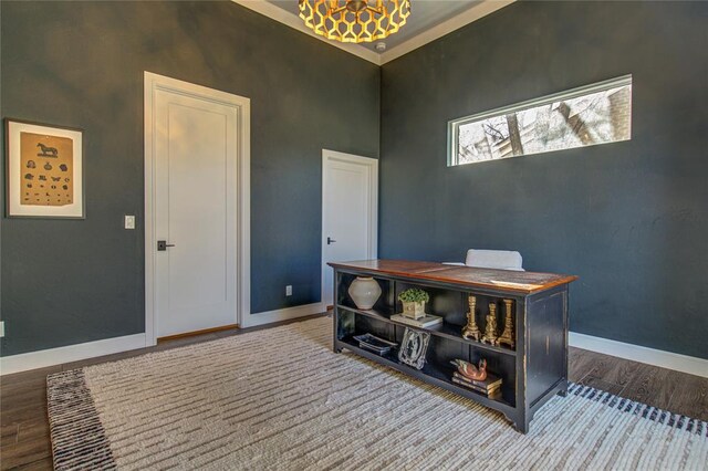 1212 W Wilshire Blvd, Nichols Hills, OK 73116 - office space featuring wood finished floors, baseboards, and a chandelier
