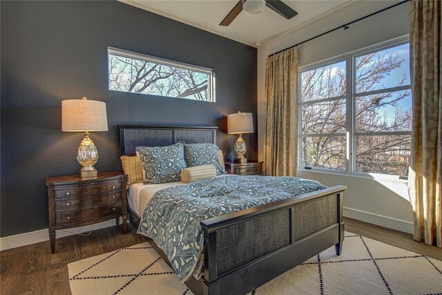 1212 W Wilshire Blvd, Nichols Hills, OK 73116 - bedroom with wood finished floors, baseboards, and ceiling fan