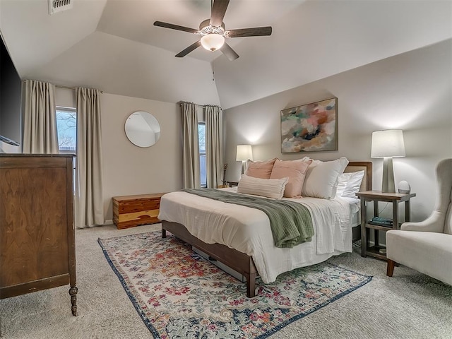 bedroom with lofted ceiling, light carpet, ceiling fan, and visible vents