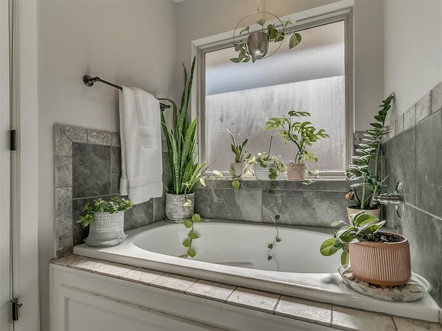 bathroom with a garden tub