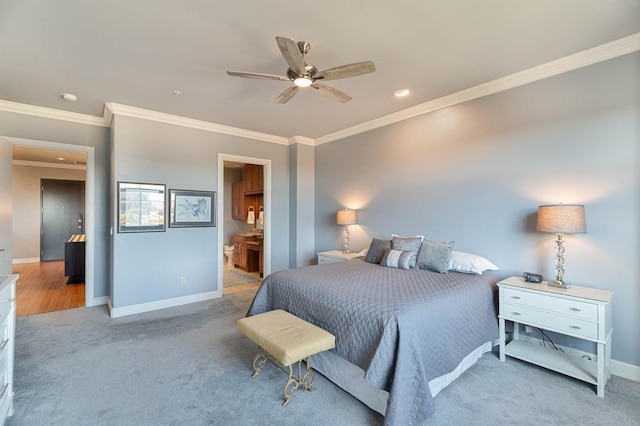200 S Oklahoma Ave Unit 305, Oklahoma City, OK 73104 - bedroom with light carpet, ornamental molding, recessed lighting, ceiling fan, and ensuite bathroom