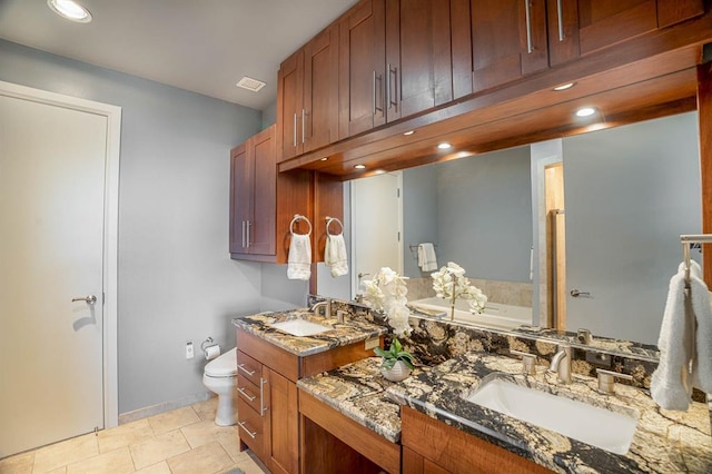 200 S Oklahoma Ave Unit 305, Oklahoma City, OK 73104 - bathroom featuring double vanity and recessed lighting