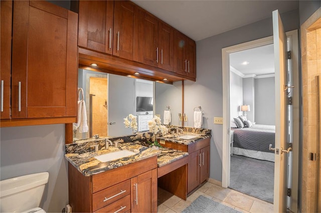 200 S Oklahoma Ave Unit 305, Oklahoma City, OK 73104 - bathroom with double vanity, ensuite bath, tile patterned floors, and recessed lighting