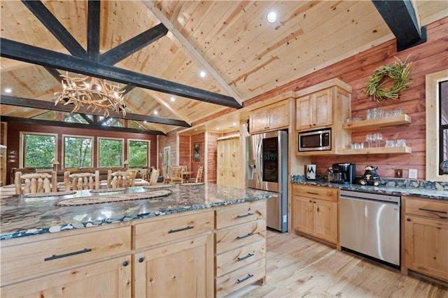 kitchen with stainless steel appliances, light brown cabinetry, wood ceiling, and light wood-style floors