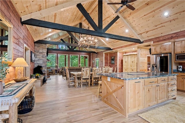 kitchen featuring wood ceiling, light brown cabinets, and appliances with stainless steel finishes