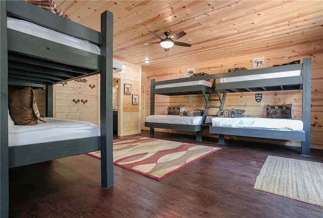 bedroom featuring wood ceiling, wood walls, and wood finished floors