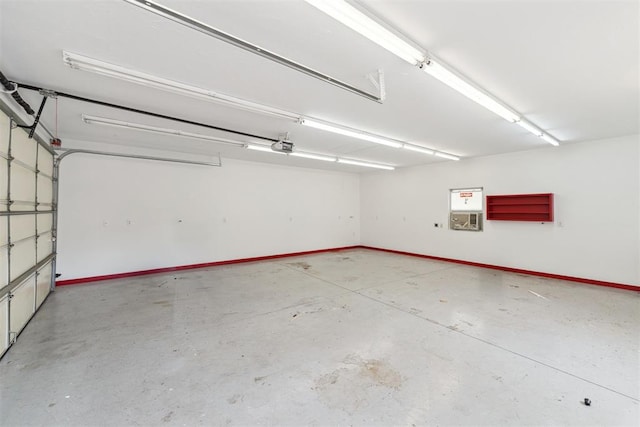 garage featuring baseboards