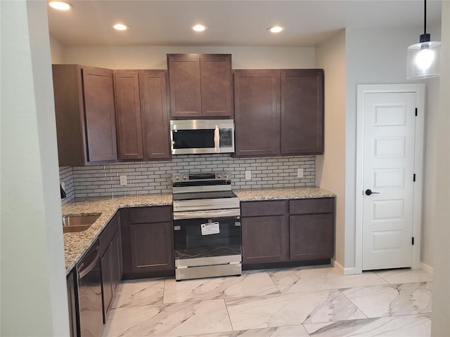 8502 NE 34th Pl, Oklahoma City, OK 73084 - kitchen with appliances with stainless steel finishes, light marble finish flooring, recessed lighting, dark brown cabinetry, and light stone counters