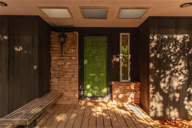 view of exterior entry with stone siding