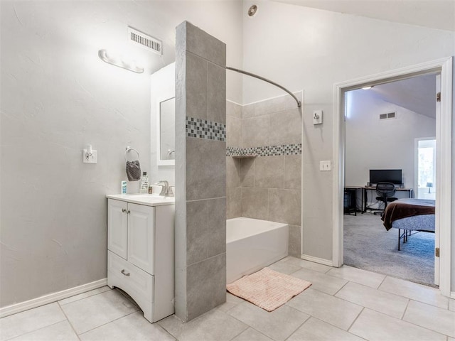 full bath featuring ensuite bathroom,  shower combination, lofted ceiling, and visible vents