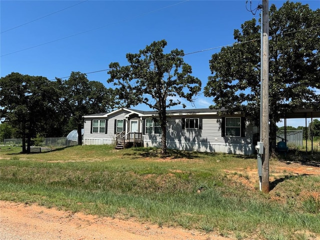 manufactured / mobile home with fence