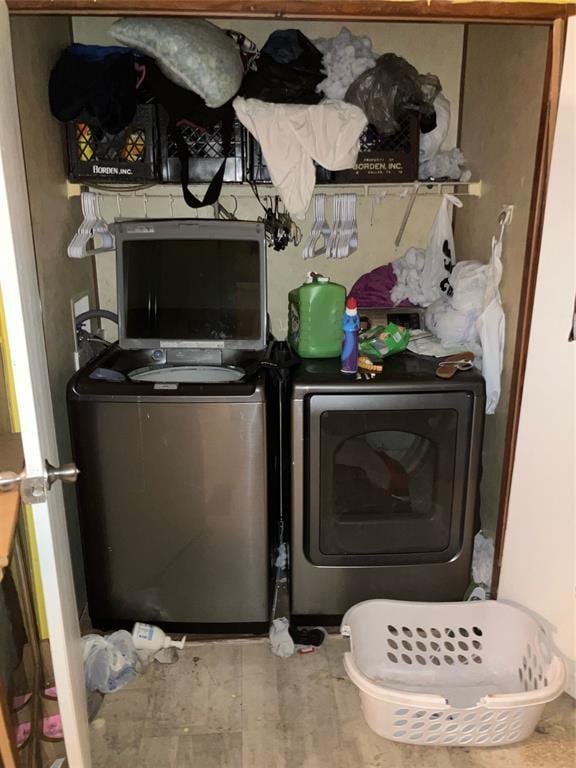 laundry area featuring laundry area and washing machine and dryer