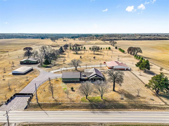 birds eye view of property featuring a rural view