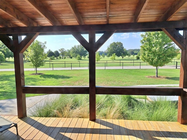 exterior space with wood ceiling and beamed ceiling