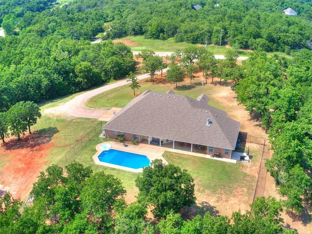 aerial view featuring a view of trees