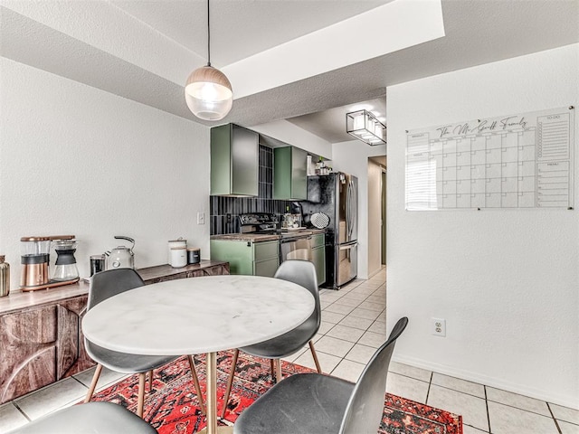 dining space featuring light tile patterned flooring