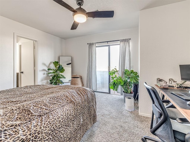 bedroom with carpet floors, access to outside, and a ceiling fan