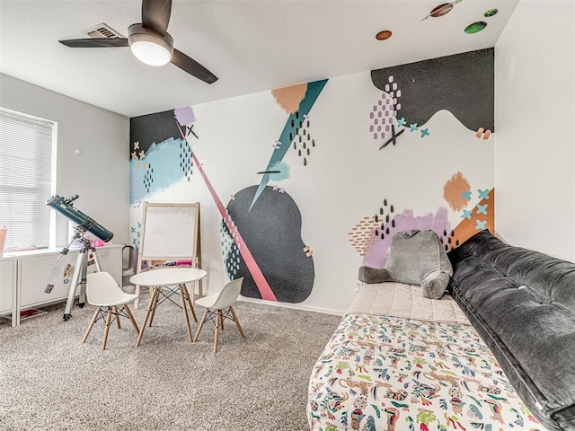 bedroom featuring a ceiling fan, light carpet, visible vents, and baseboards