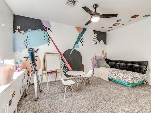 bedroom featuring carpet flooring, ceiling fan, and visible vents