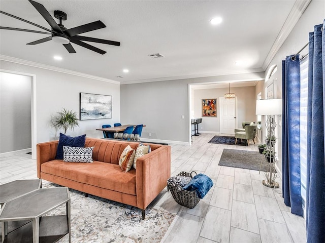 living area with ceiling fan, ornamental molding, visible vents, and baseboards