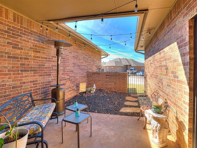 view of patio featuring fence