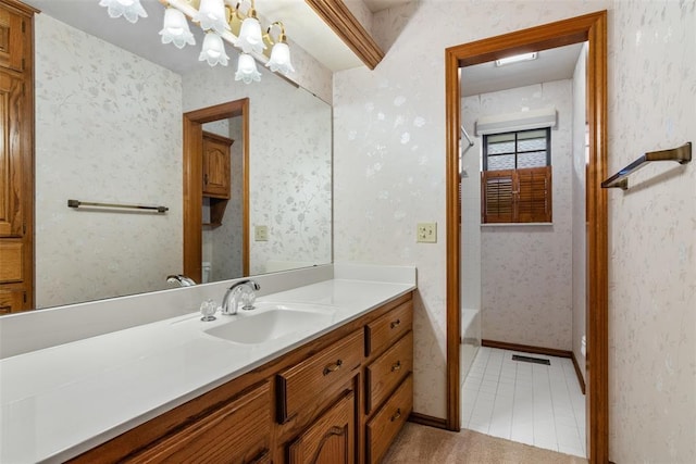 bathroom featuring wallpapered walls, visible vents, baseboards, and vanity