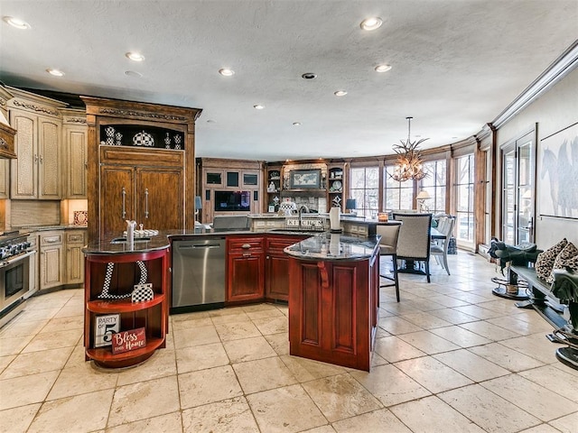 kitchen featuring a breakfast bar, crown molding, open shelves, stainless steel appliances, and a kitchen island with sink