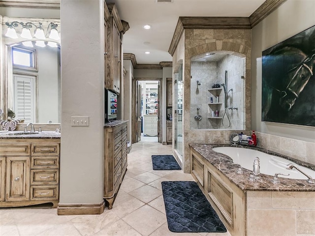 full bath featuring ornamental molding, a stall shower, a garden tub, and vanity