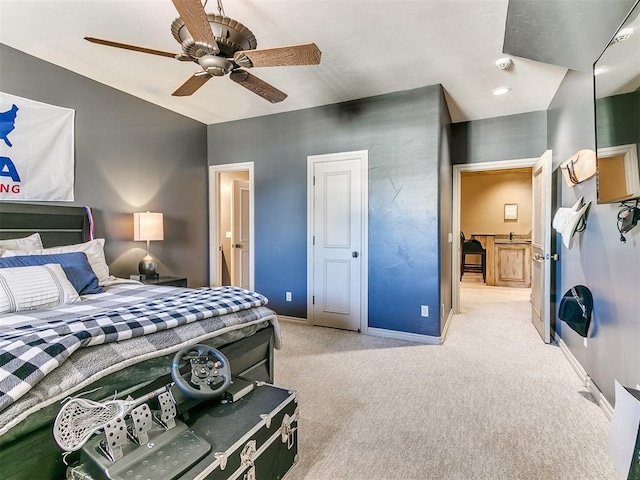 bedroom featuring ceiling fan, baseboards, and light colored carpet