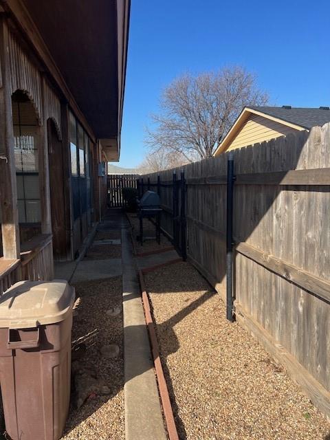 view of yard featuring a fenced backyard and a patio