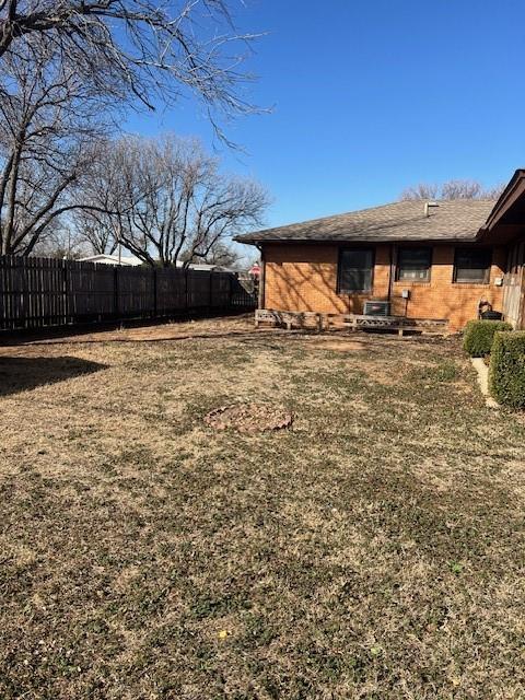 view of yard with fence