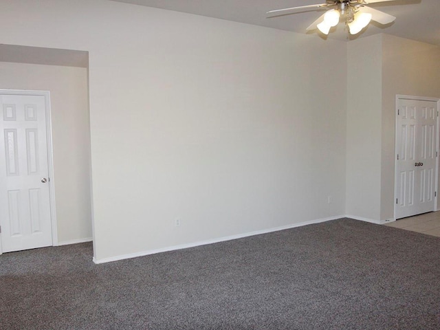 unfurnished room with light carpet, ceiling fan, and baseboards