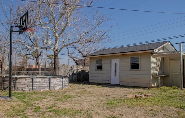 view of outdoor structure featuring a fenced in pool and fence