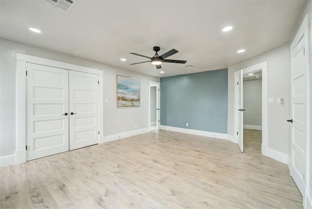 unfurnished bedroom with recessed lighting, visible vents, and light wood-style flooring