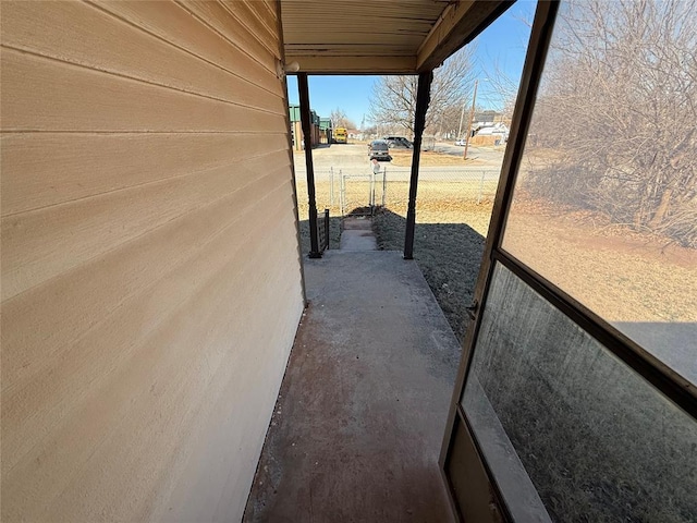 view of patio / terrace featuring fence