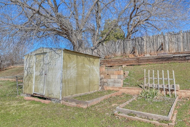 view of shed with fence