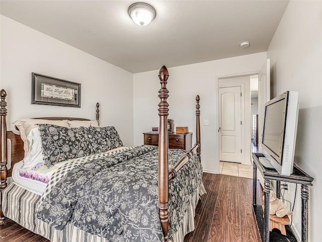 bedroom featuring wood finished floors