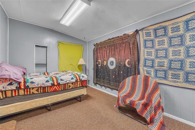 bedroom featuring carpet and lofted ceiling