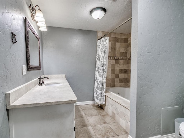 18303 Stevens Rd, Shawnee, OK 74801 - full bath featuring vanity, tiled shower / bath combo, a textured wall, tile patterned flooring, and a textured ceiling