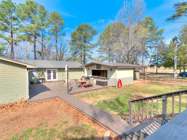 18303 Stevens Rd, Shawnee, OK 74801 - rear view of house featuring a wooden deck, french doors, and a yard