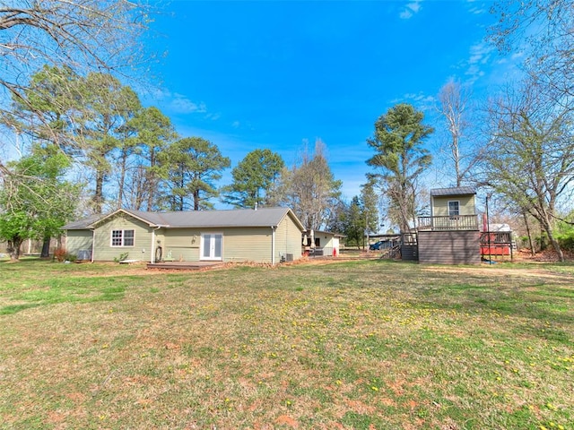 18303 Stevens Rd, Shawnee, OK 74801 - view of green lawn with a deck