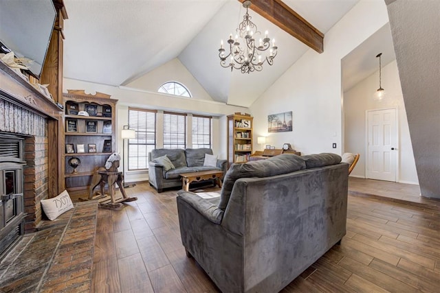 living area featuring a notable chandelier, high vaulted ceiling, dark wood finished floors, and beam ceiling