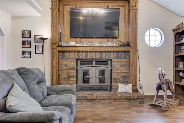 living room with baseboards and wood finished floors