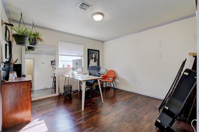 home office featuring baseboards, visible vents, ornamental molding, and wood finished floors