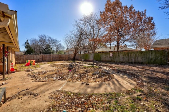 view of yard featuring a patio and a fenced backyard